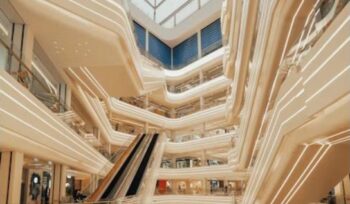 Modern shopping mall atrium interior - Franchising Expansion in the UAE