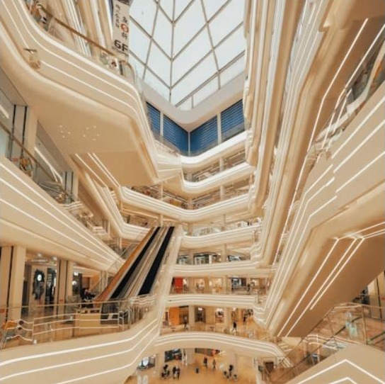 Modern shopping mall atrium interior - Franchising Expansion in the UAE